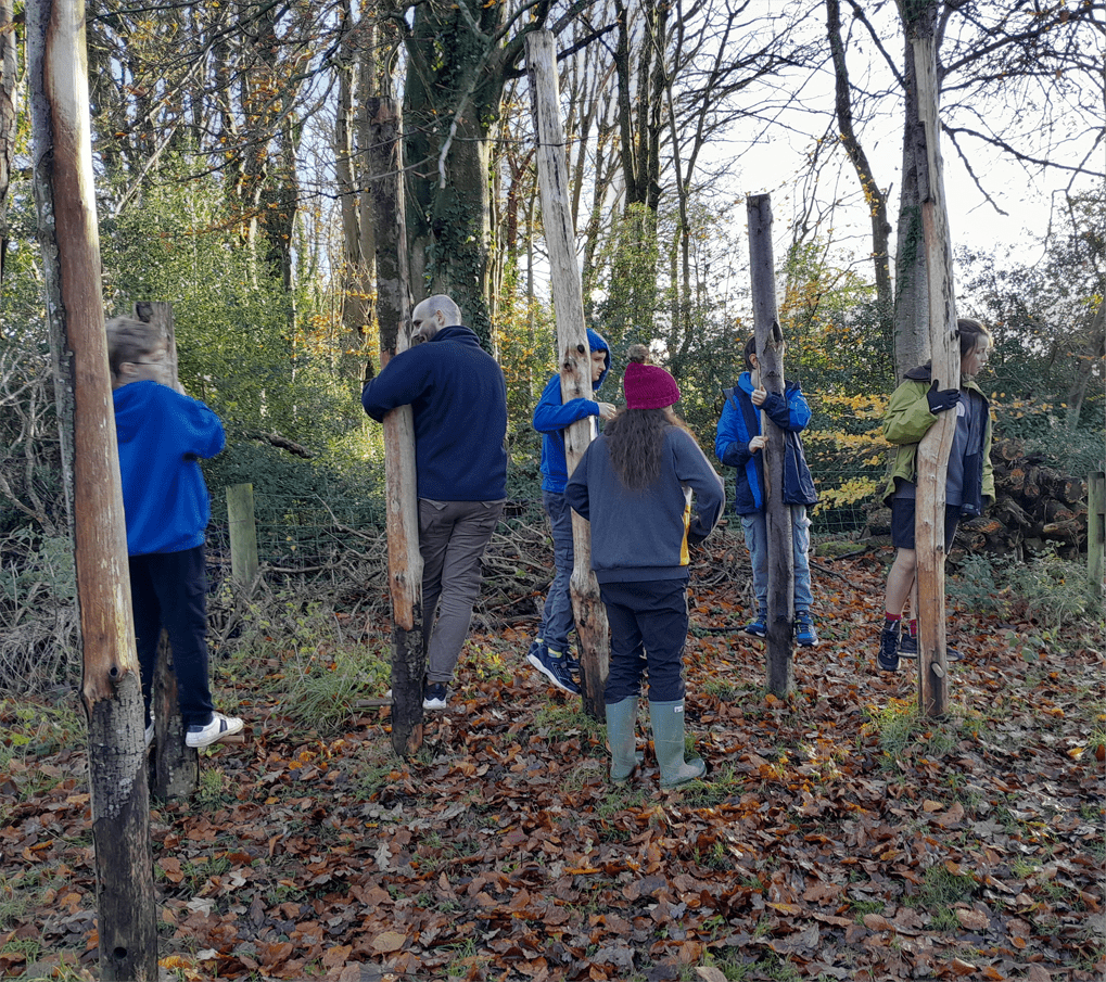 Teamwork in action: Highgate Hill House learners tackling low-ropes challenges at Magdalen Farm.