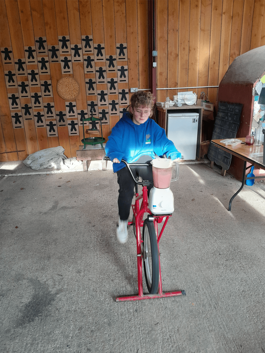 Pedal power in action: Highgate Hill House learners making smoothies on bicycles at Magdalen Farm.