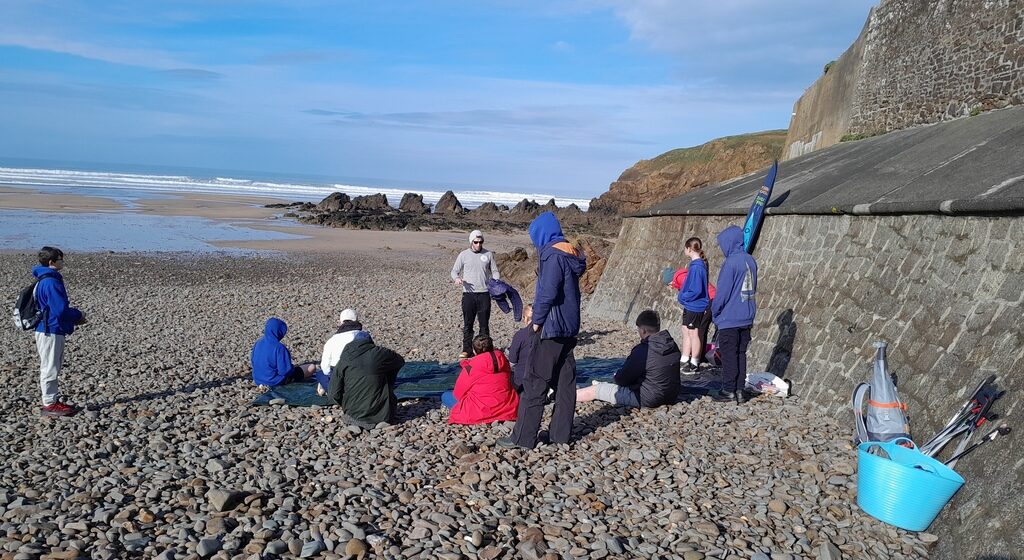 Highgate Hill House School learners take part in a beach clean, microplastic study, wildlife walk, and rockpooling with 2 Minute Beach Clean at Crooklets Beach.