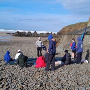 Highgate Hill House School learners take part in a beach clean, microplastic study, wildlife walk, and rockpooling with 2 Minute Beach Clean at Crooklets Beach.